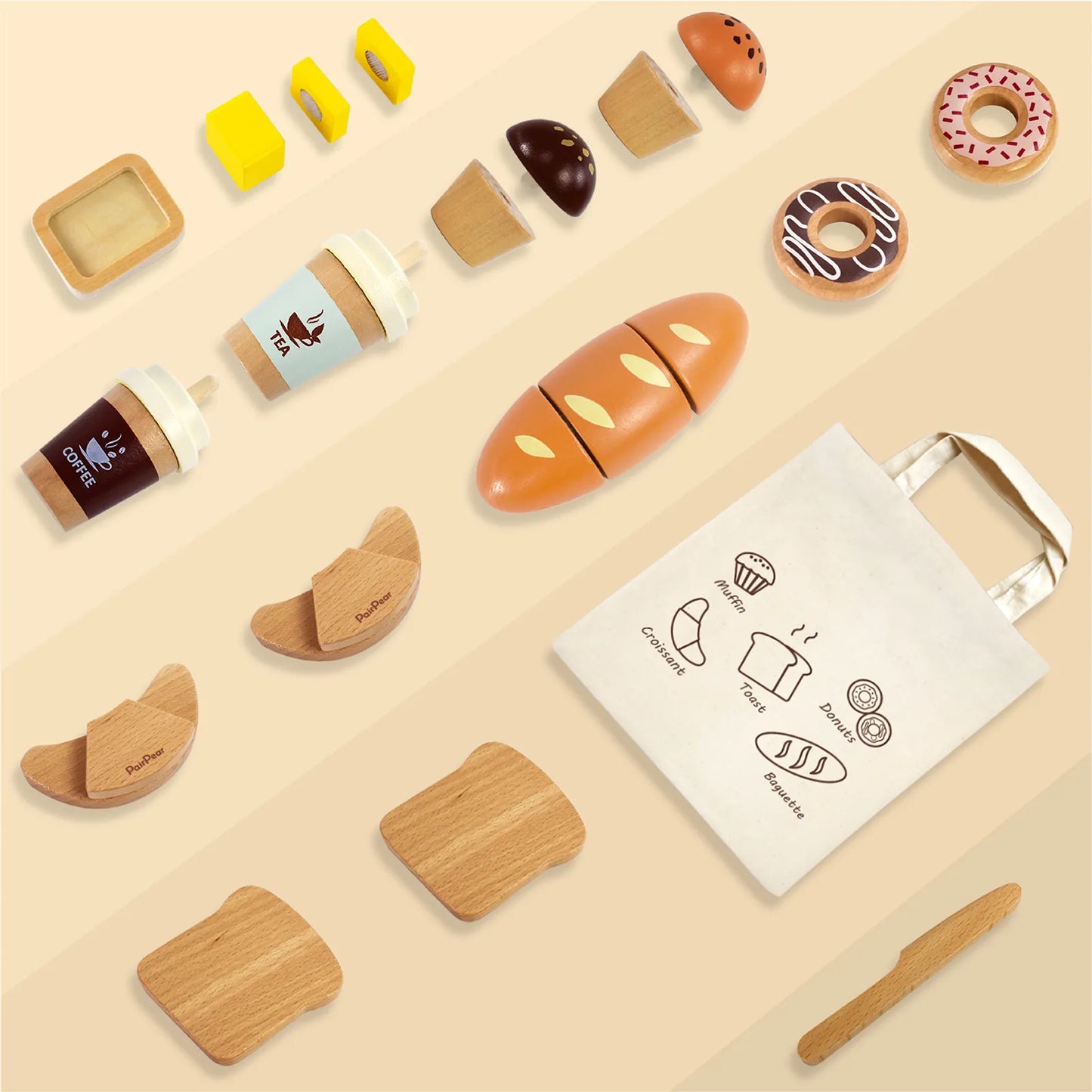 Flat lay view of the complete kids wooden bakery toy set. Includes a shopping bag, pretend coffee, cuttable bread, croissants, butter, and donuts.