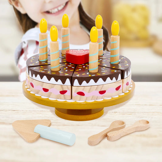 Toddler girl playing with a wooden birthday cake toy. This pretend play food set is a perfect gift for kids to enjoy imaginary birthday parties.