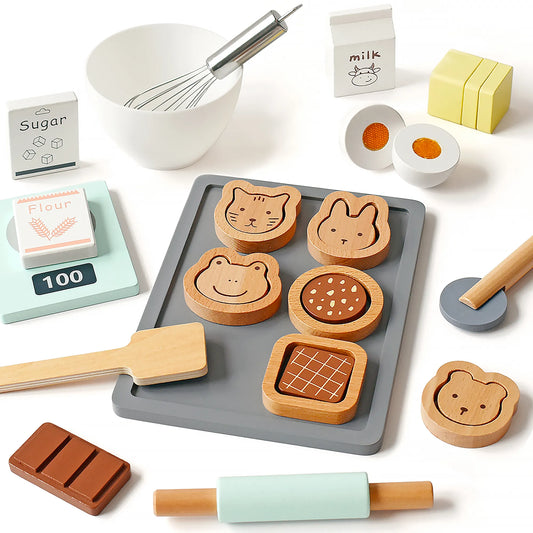 Flat lay view of a kids wooden baking toy set. Features pretend play food like cute animal cookies, a toy rolling pin, cuttable egg, and whisk.