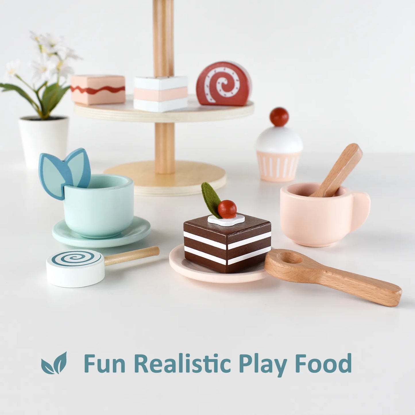 Fun and realistic wooden play food featuring a detailed chocolate cake, teacups, and lollipops, perfect for a kids imaginative tea party